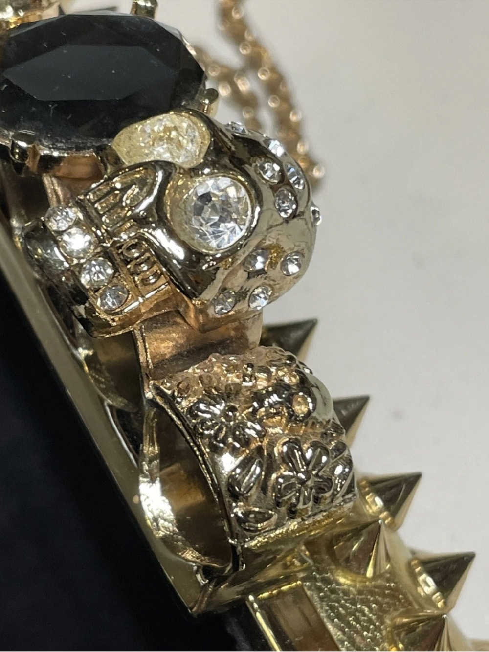Edgy style Gold Spike Evening Clutch/ crossbody bag with skull knuckle handle - Picture 9 of 13
